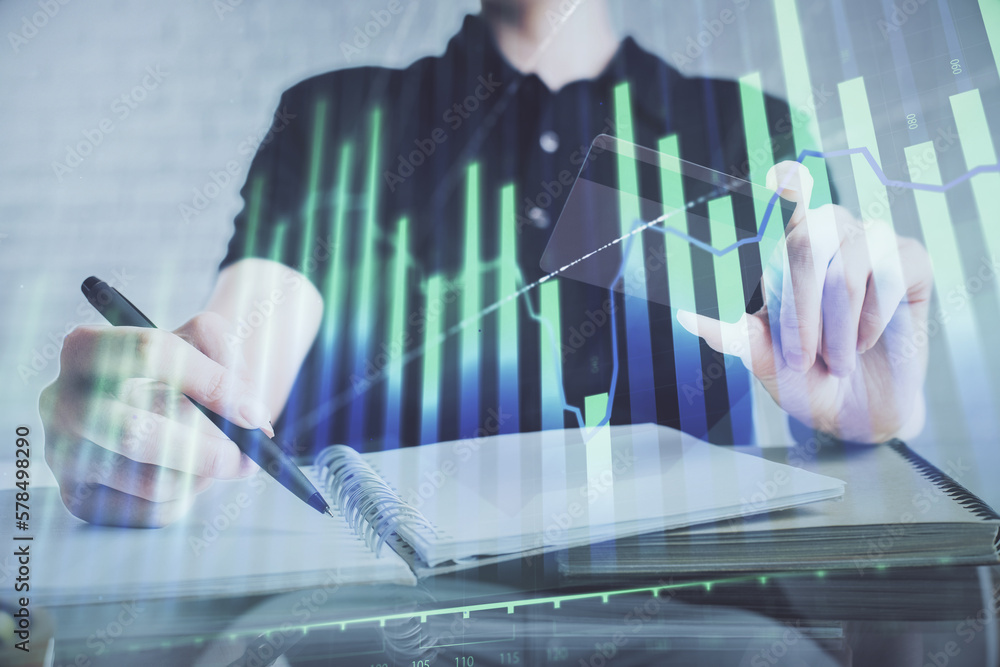 Poster double exposure of man hands holding a credit card and forex graph drawing. stock trading and digita