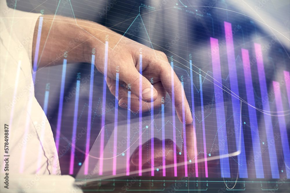 Poster double exposure of man's hands holding and using a digital device and forex graph drawing. financial