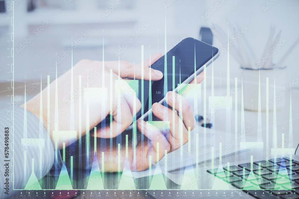 Aufkleber double exposure of man's hands holding and using a digital device and forex graph drawing. financial