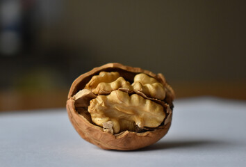 Walnut on wooden table