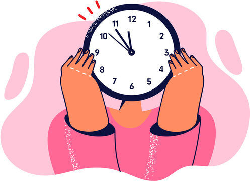 Woman hides face behind watch to show tiredness from overwork and overload due to strict deadlines