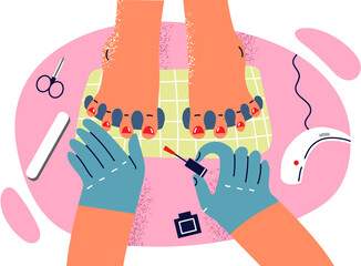 Hands professional beautician from spa salon doing pedicure and varnishing woman nails