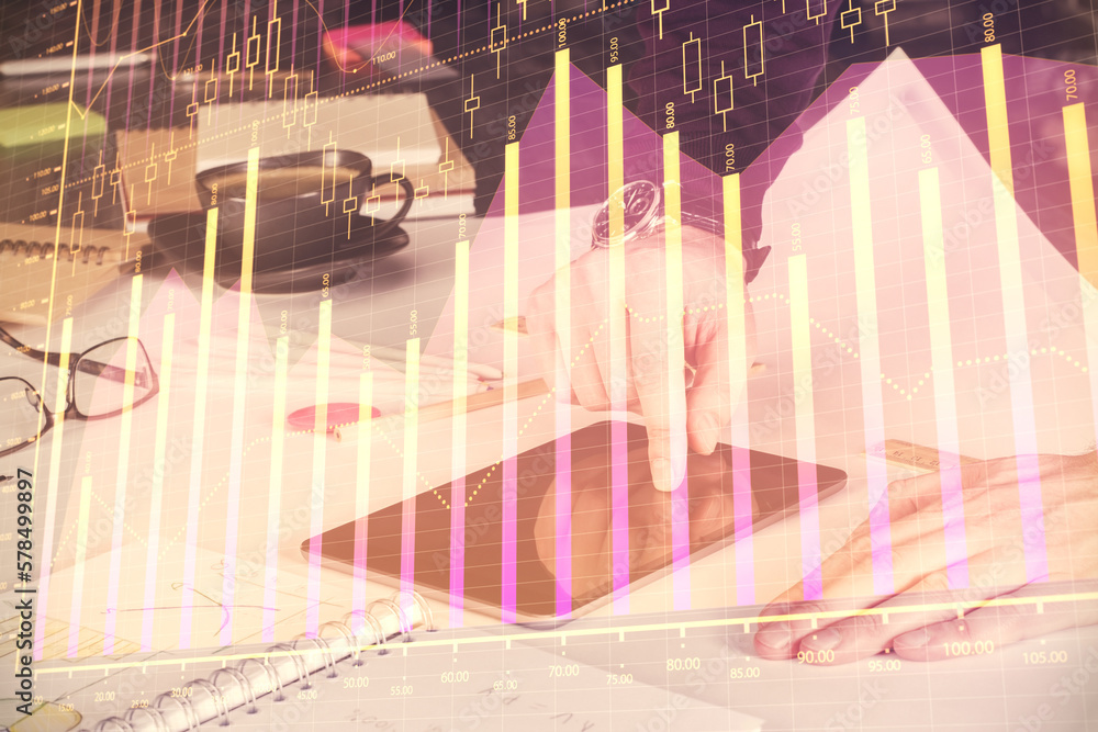 Aufkleber double exposure of man's hands holding and using a digital device and forex graph drawing. financial