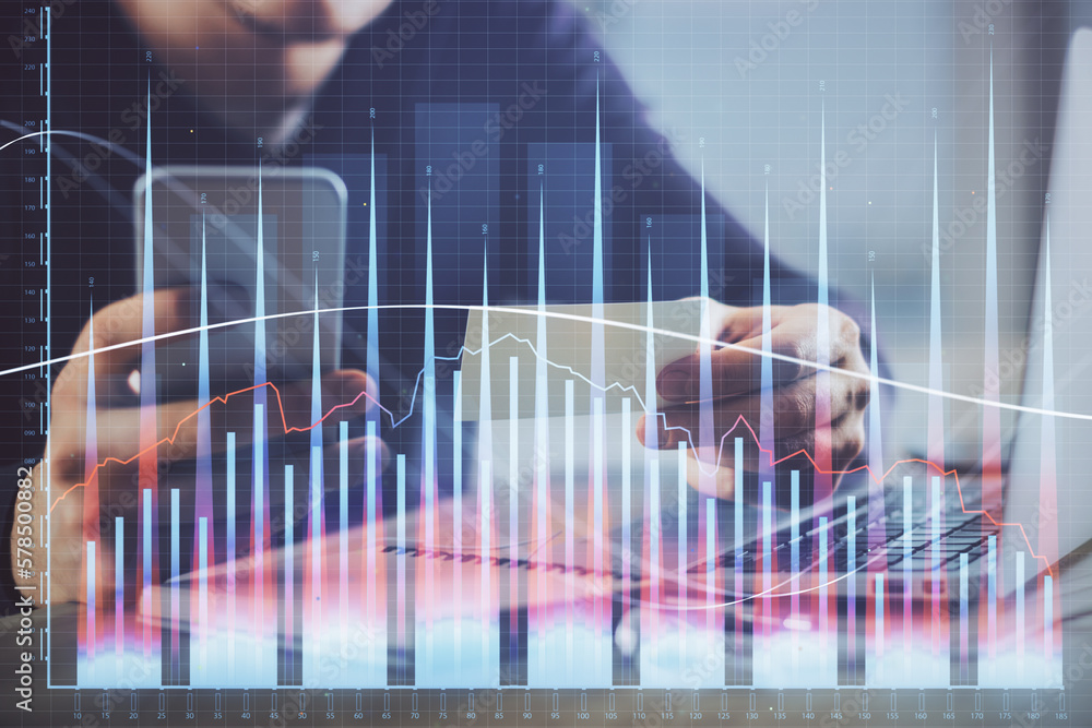 Poster double exposure of man's hands holding and using a phone and financial graph drawing. analysis conce