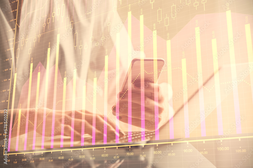 Poster double exposure of financial graph sketch hologram and woman holding and using a mobile device. stoc