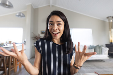 Happy biracial woman having video call