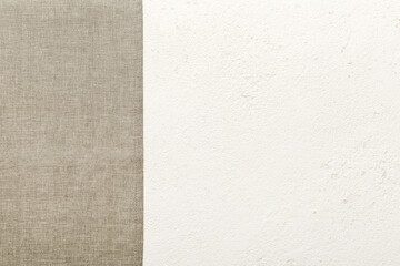 top view with gray kitchen napkin isolated on table background. Folded cloth for mockup with copy space, Flat lay. Minimal style