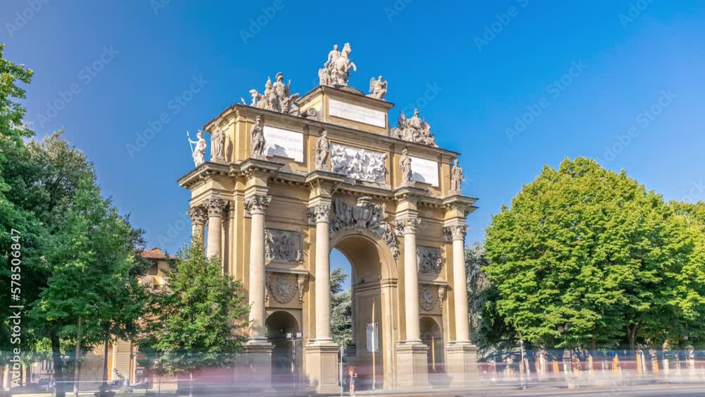 Wall mural Triumphal Arch of Lorraine timelapse on Piazza della Liberta. Traffic on the road. Sunny summer day. Popular touristic european destination. Florence city view with green trees