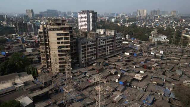 Aerial jib shot showing the Dharavi slums in Mumbai, Maharashtra, India. Dharavi is considered to be one of the largest slums in the world and the largest in Asia.