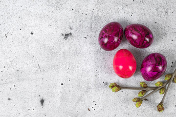 Easter eggs on a light gray background. Easter eggs magenta color