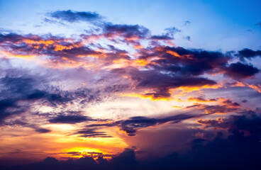 Fototapeta premium Colorful cloudy sky at sunset. Gradient color. Sky texture, abstract nature background