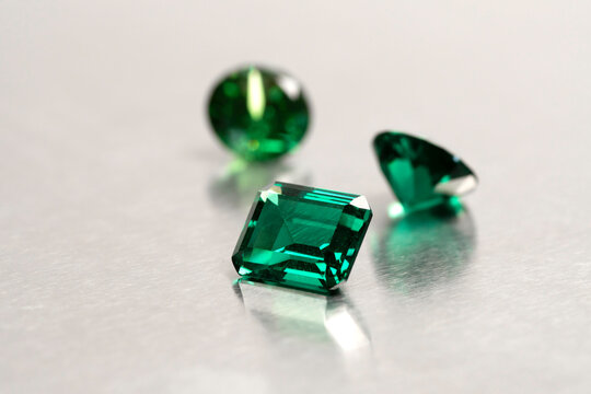 raw emeralds, gemstone jewelry, close up shot