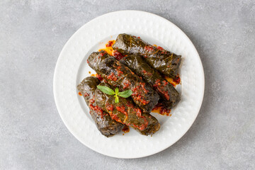 Stuffed collard greens with boiled leaves, traditonal turkish black sea region food, sarma, dolma (Turkish name; Kara lahana sarmasi)