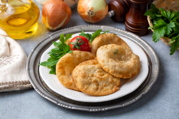 Delicious meat pie from Turkish cuisine. Fried handmade pies. Turkish name; fincan boregi or puf borek