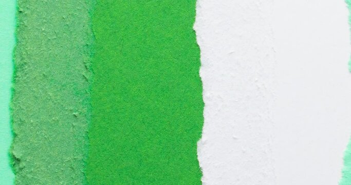 Animation of teared colourful paper pieces changing