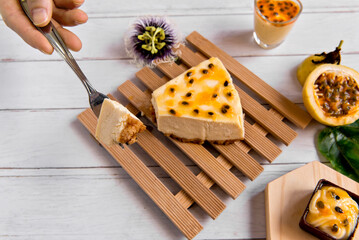 Cheescake with passion fruit syrup, passion fruit sweets