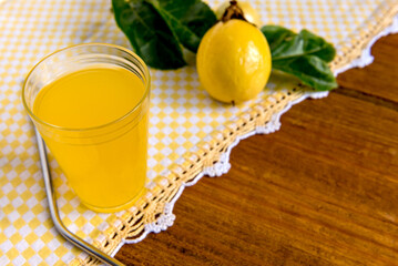 Passion fruit juice on wooden table