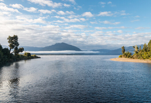 Arnold River outlet on Lake Brunner (Moana) with Mount Te Kinga in distance, West Coast, South Island, New Zealand