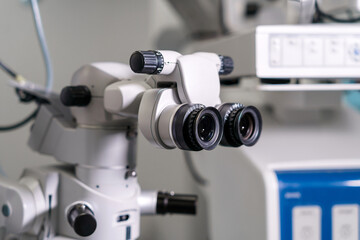 Fototapeta na wymiar Surgical microscope in an ophthalmological clinic. Microsurgical optical equipment