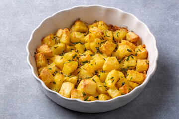 Baked potatoes with spices and rosemary