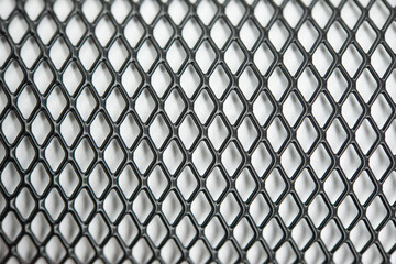Naklejka premium Steel grating, abstract texture Metallic net background. metal mesh.