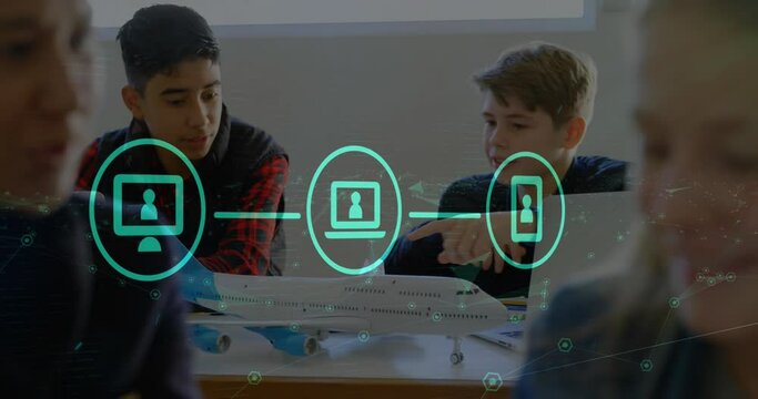 Animation of network of digital icons over two diverse boys discussing over airplane model at school