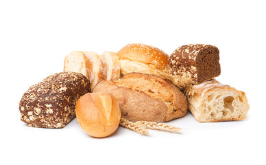 Loaves of different bread and wheat ears isolated on white background