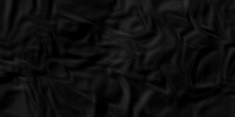 Fototapeta premium Dark Black facbric paper backdrop crumpled texture. dark black textured crumpled black paper background. panorama black paper texture background, crumpled pattern.