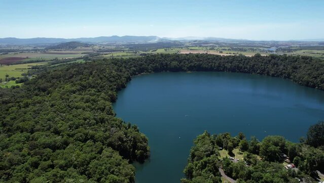 Spectacular aerial footage of Lake Eacham Atherton Tablelands Queensland Australia