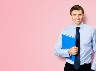 Portrait image - smiling business man in confident cloth, necktie, tie with folder, isolate on rose pink background. Businessman, bank account manager, layer, real estate sales agent