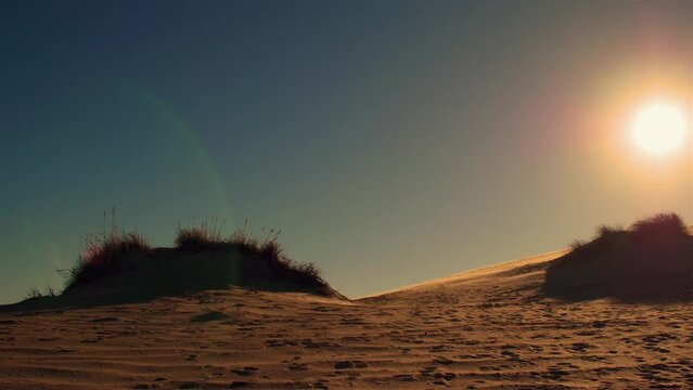 OBX dune sand sunset golden hour wide shot UHD 60fps