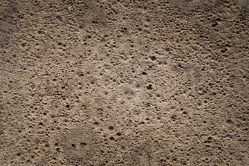 The texture of the cement and concrete wall is similar to the lunar surface. Texture for pattern or background