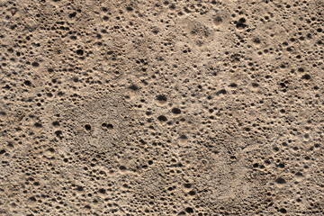 The texture of the cement and concrete wall is similar to the lunar surface. Texture for pattern or background