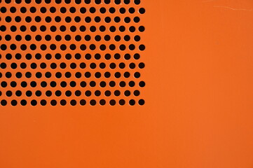 orange computer cpu texture background with black hole