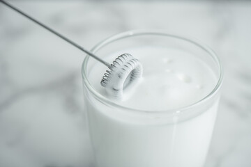 Froth milk with milk frother