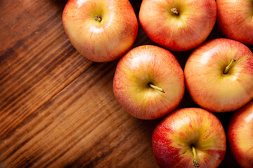 Several Royal Gala Apples (malus domestica)..Apple trees are cultivated worldwide and are the most widely used species of the genus Malus. Table top view.
