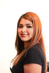 Naklejka premium Pretty, young woman, smiling, with straight, red hair.