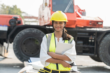 Foreman builder woman at construction site. Asian foreman construction woman working at construction site