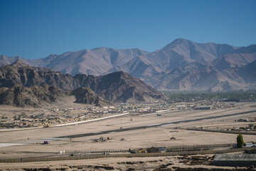 the Leh airport is surrounded by mountain peaks at Ladakh, India