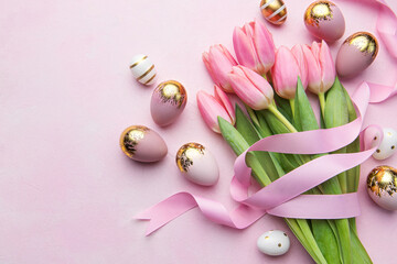 Fototapeta na wymiar Pink tulips and Easter eggs background