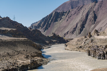 Indus river and mountains on either side at Ladakh, Himalayas, Jammu and Kashmir, Northern India