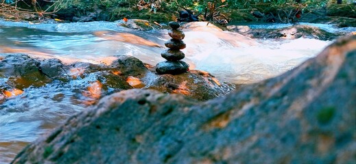 the art of piling stones in the river