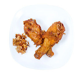 Fried Chicken Drumstick on white dish isolated