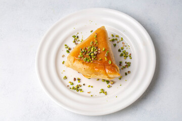 Traditional Turkish desserts; custard triangular dessert, albanian dessert ( Turkish name; Arnavut tatlisi or muhallebili muska tatlisi)