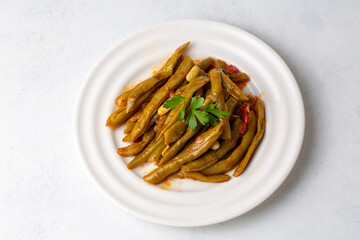 Traditional delicious Turkish food; Green beans with olive oil; Turkish name; Zeytinyagli taze fasulye