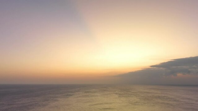 aerial hyperlapse view light through the sky at Promthep cape.Promthep cape viewpoint is the most popular viewpoint in Phuket island..Beautiful Sunset Sun Cirrus Clouds in Colorful Sky.