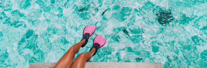Snorkeling beach vacation travel snorkel woman legs swimming in turquoise blue ocean tropical...