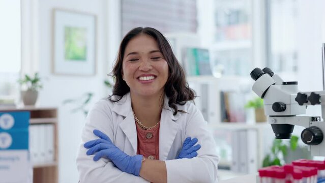Happy face of scientist woman in office with blood test, microscope exam and healthcare research and proud leadership. Doctor or medical asian female in biotechnology with bacteria, blood or dna exam