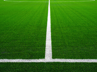 Obraz premium Football field of artificial grass. White line on the soccer green field.