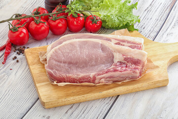 Raw pork t-bone steak for grill